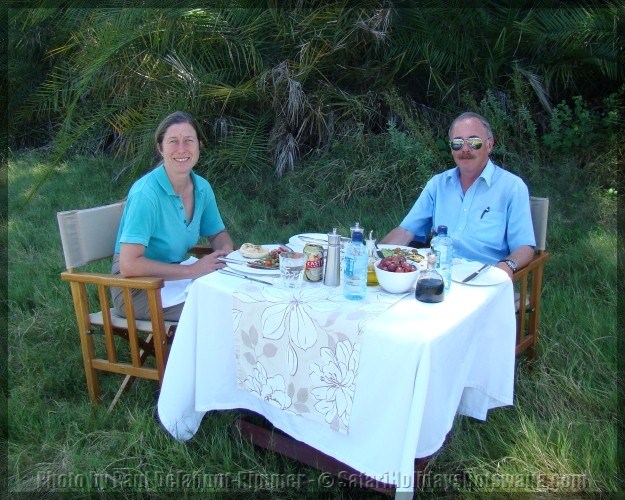 Paul & Henrietta Delahunt-Rimmer of Special Interest Holidays enjoying lunch in the bush on safari in Botswana